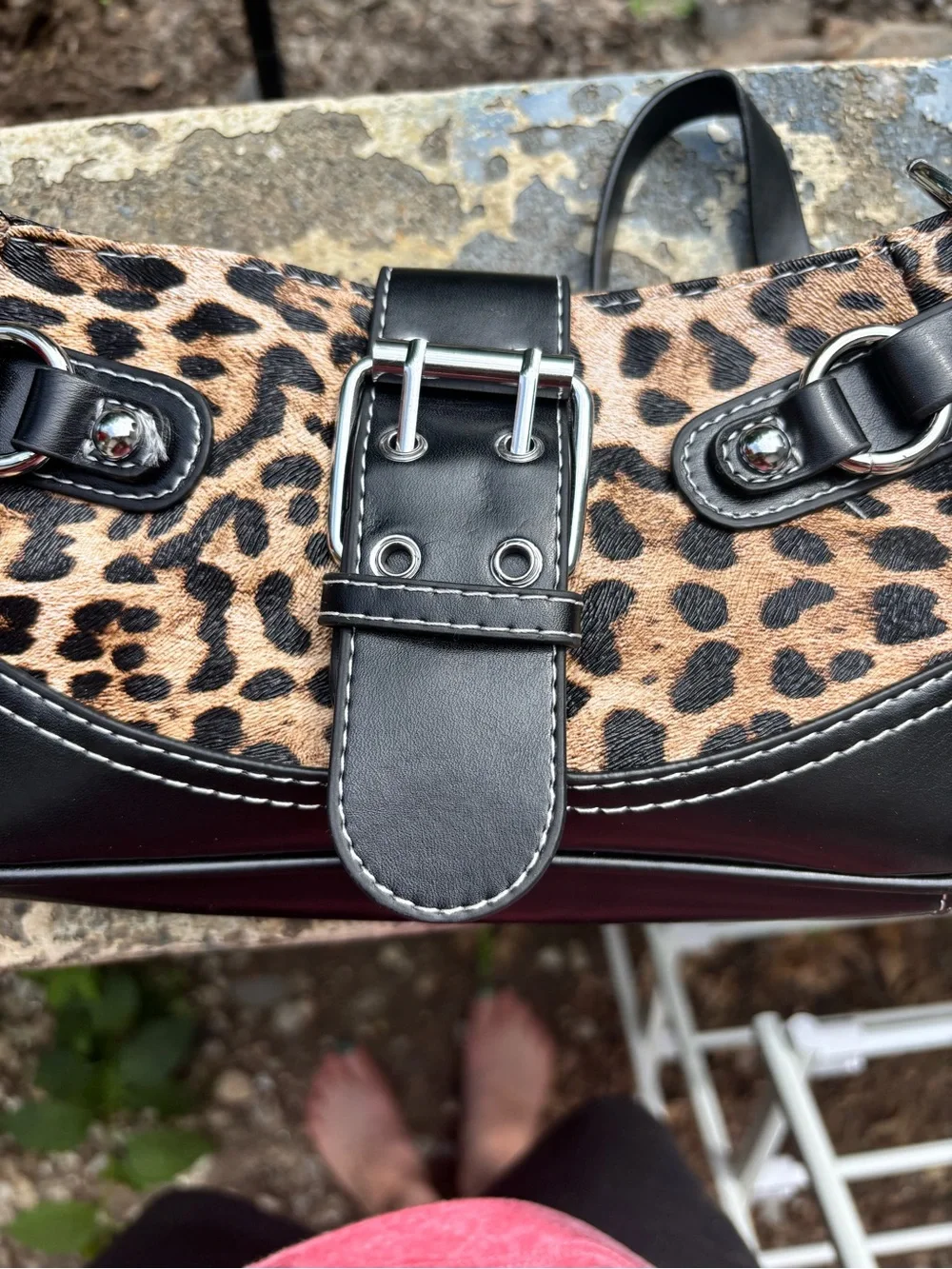 Leopard Print Shoulder Bag with Black Trim and Buckle Accent